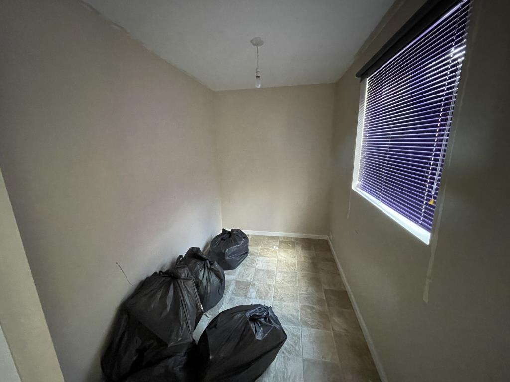 Lot: 95 - HOUSE IN POPULAR RESIDENTIAL AREA FOR INVESTMENT OR OCCUPATION - Inside image of study room, from reception extension